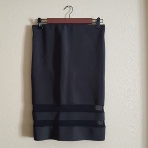 Mid length black skirt from H&M